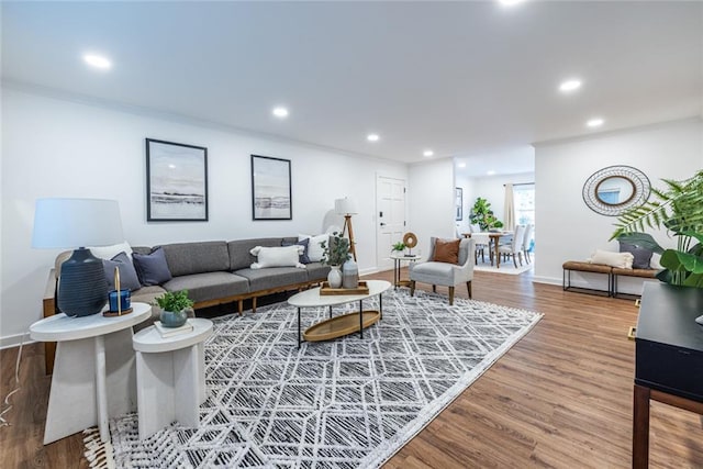 115 Biscayne Dr NW Unit F10, Atlanta, GA 30309 - living area with baseboards, recessed lighting, crown molding, and wood finished floors