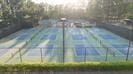 view of sport court with fence