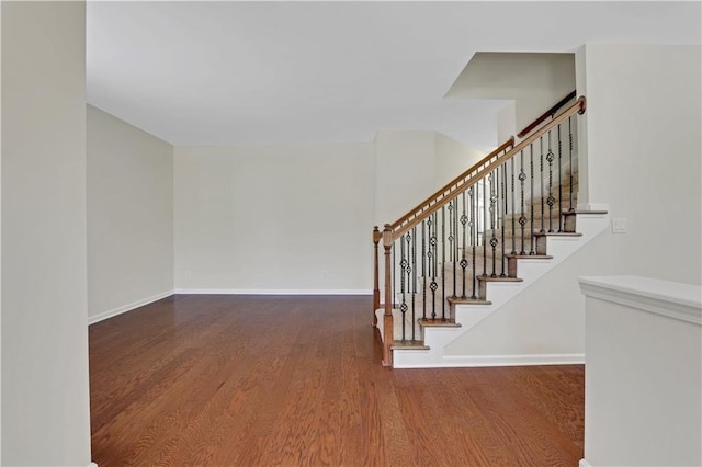 3485 Walnut Rdg, Atlanta, GA 30349 - stairway featuring wood finished floors and baseboards