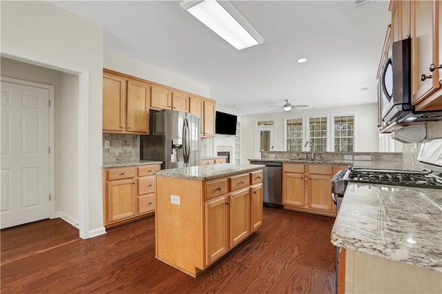 3485 Walnut Rdg, Atlanta, GA 30349 - kitchen with stainless steel appliances, a sink, tasteful backsplash, light stone countertops, and recessed lighting