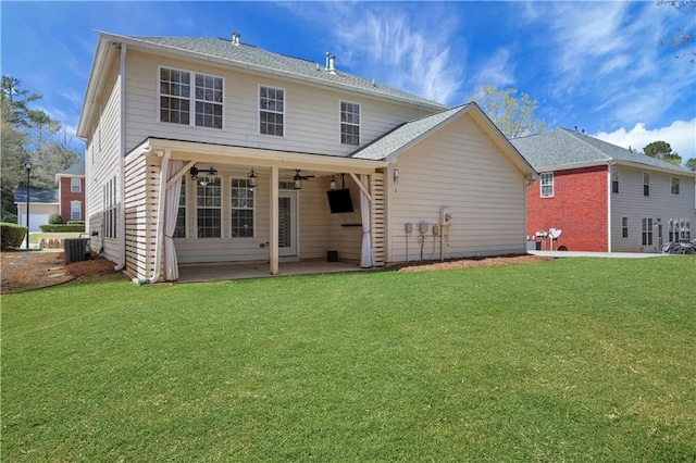 3485 Walnut Rdg, Atlanta, GA 30349 - back of house with a patio, a yard, cooling unit, and ceiling fan
