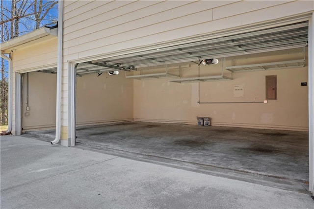 3485 Walnut Rdg, Atlanta, GA 30349 - garage with a garage door opener and electric panel