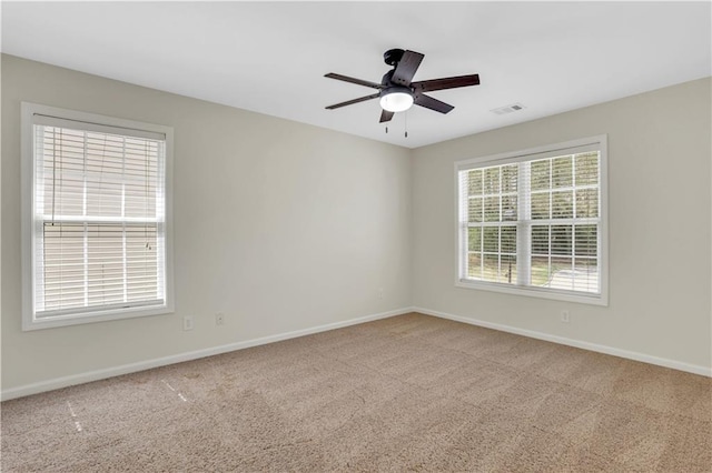3485 Walnut Rdg, Atlanta, GA 30349 - carpeted empty room featuring baseboards and ceiling fan