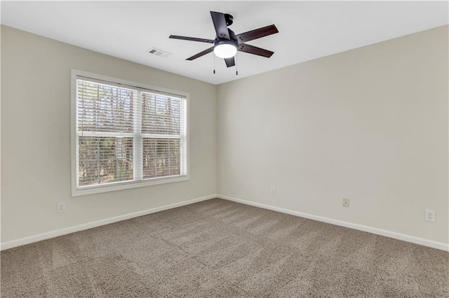 3485 Walnut Rdg, Atlanta, GA 30349 - spare room with baseboards, carpet floors, and a ceiling fan
