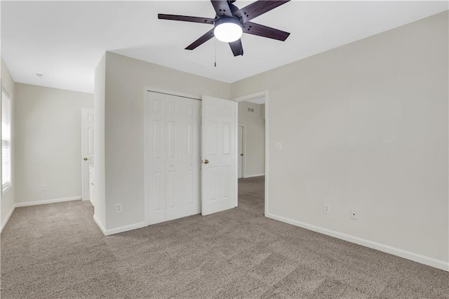 3485 Walnut Rdg, Atlanta, GA 30349 - unfurnished bedroom with carpet flooring, a closet, and baseboards