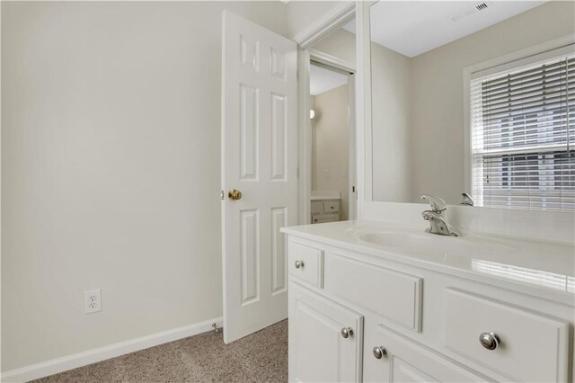 3485 Walnut Rdg, Atlanta, GA 30349 - bathroom featuring vanity and baseboards