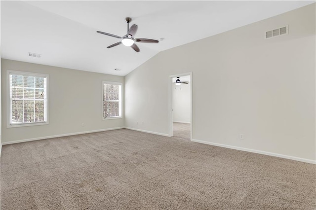 3485 Walnut Rdg, Atlanta, GA 30349 - carpeted empty room with a ceiling fan, vaulted ceiling, and baseboards