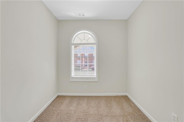3485 Walnut Rdg, Atlanta, GA 30349 - carpeted spare room with baseboards