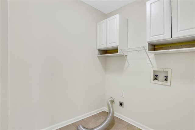 3485 Walnut Rdg, Atlanta, GA 30349 - washroom featuring electric dryer hookup, baseboards, hookup for a washing machine, cabinet space, and light tile patterned floors
