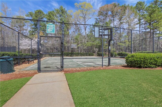 3485 Walnut Rdg, Atlanta, GA 30349 - view of sport court featuring community basketball court and a gate