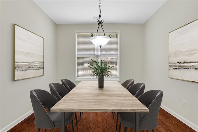 3485 Walnut Rdg, Atlanta, GA 30349 - dining space featuring baseboards and wood finished floors