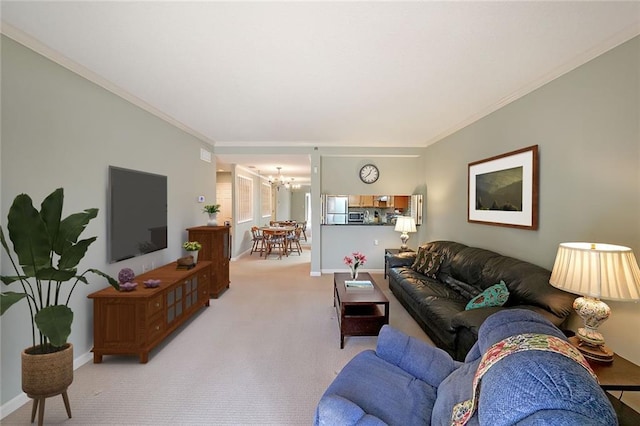 living room featuring light colored carpet, a notable chandelier, and crown molding