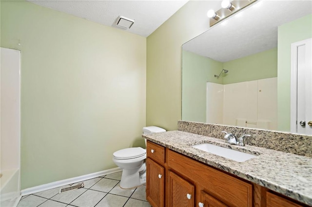 bathroom with visible vents, tile patterned flooring, a shower, baseboards, and toilet