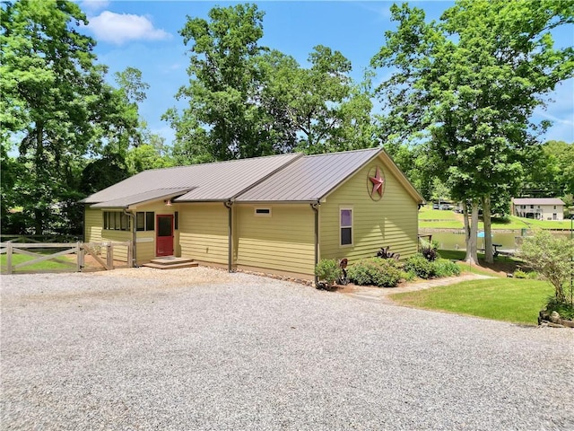 184 Bradley Rd, Jackson, GA 30233 - view of front of property featuring driveway and metal roof