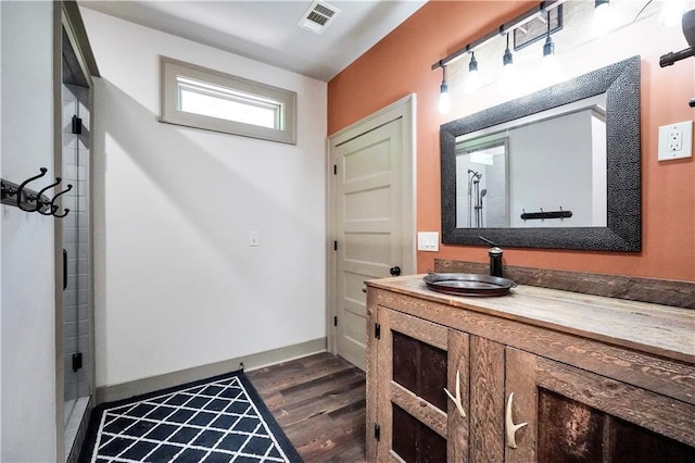 184 Bradley Rd, Jackson, GA 30233 - bathroom with wood finished floors and vanity