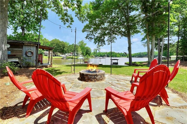 184 Bradley Rd, Jackson, GA 30233 - view of patio with a fire pit and a water view
