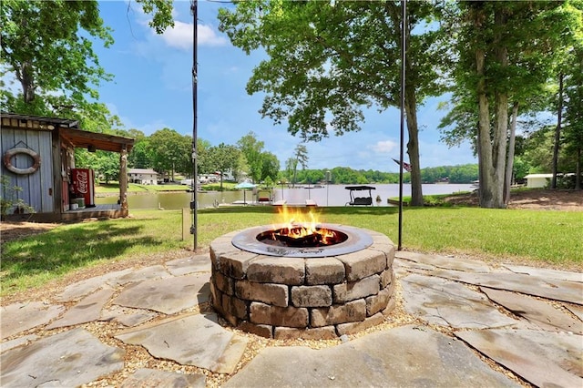184 Bradley Rd, Jackson, GA 30233 - view of patio with an outdoor fire pit and a water view