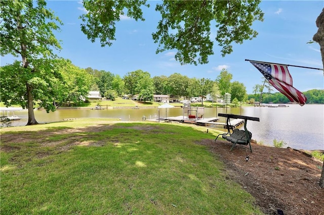 184 Bradley Rd, Jackson, GA 30233 - view of green lawn with a water view and a dock
