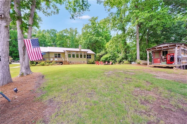 184 Bradley Rd, Jackson, GA 30233 - view of green lawn featuring a wooden deck