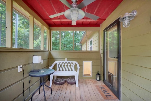 184 Bradley Rd, Jackson, GA 30233 - sunroom / solarium featuring a ceiling fan, hardwood / wood-style floors, wood walls, and plenty of natural light