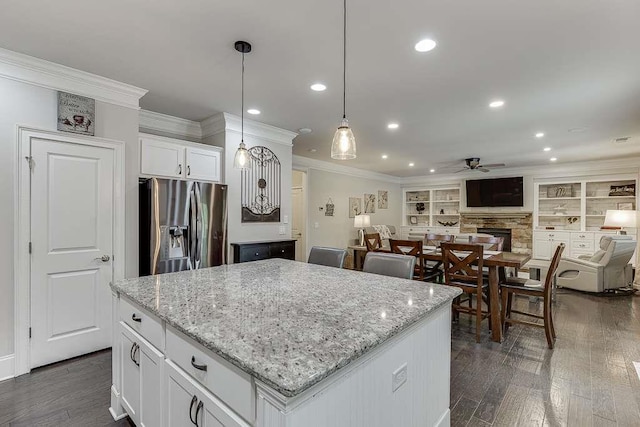 470 Wagon Hill Ln, Sugar Hill, GA 30518 - kitchen featuring stainless steel fridge, a ceiling fan, crown molding, dark wood finished floors, and a kitchen island