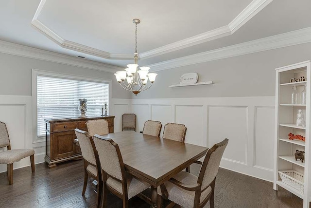 470 Wagon Hill Ln, Sugar Hill, GA 30518 - dining space with a decorative wall, a chandelier, a raised ceiling, wainscoting, and ornamental molding