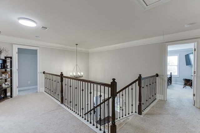 470 Wagon Hill Ln, Sugar Hill, GA 30518 - hallway featuring light colored carpet, an upstairs landing, attic access, crown molding, and baseboards
