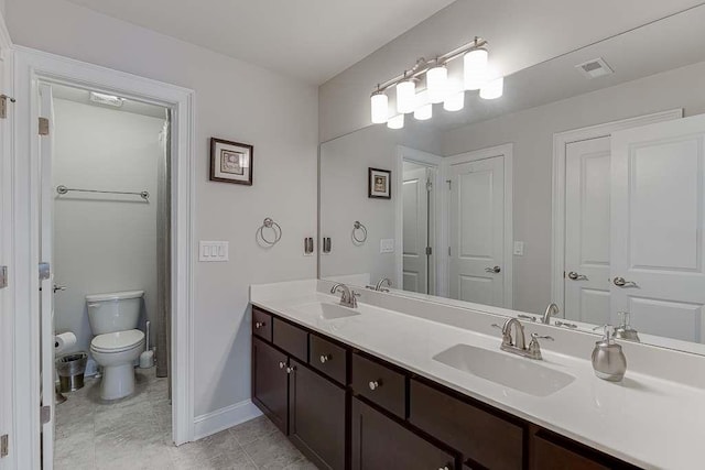 470 Wagon Hill Ln, Sugar Hill, GA 30518 - full bathroom featuring double vanity, toilet, and baseboards