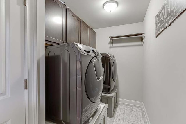 470 Wagon Hill Ln, Sugar Hill, GA 30518 - laundry room featuring cabinet space, washing machine and dryer, and baseboards