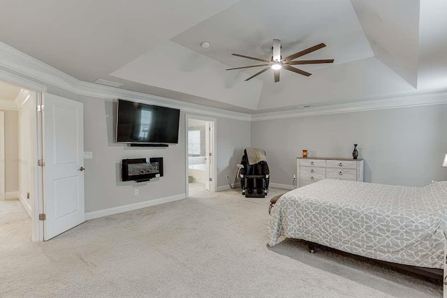 470 Wagon Hill Ln, Sugar Hill, GA 30518 - carpeted bedroom featuring a raised ceiling, crown molding, baseboards, ensuite bath, and a ceiling fan