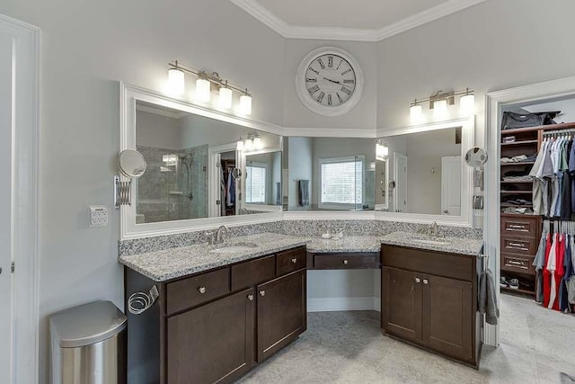 470 Wagon Hill Ln, Sugar Hill, GA 30518 - bathroom with double vanity, a spacious closet, a tile shower, and ornamental molding