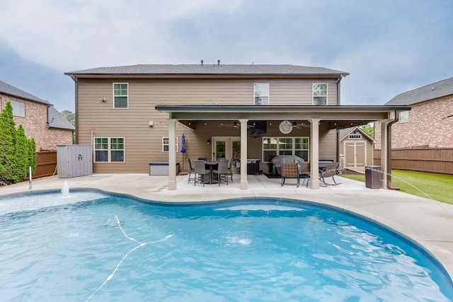 470 Wagon Hill Ln, Sugar Hill, GA 30518 - back of house with a fenced backyard, a patio area, an outdoor living space, and a ceiling fan