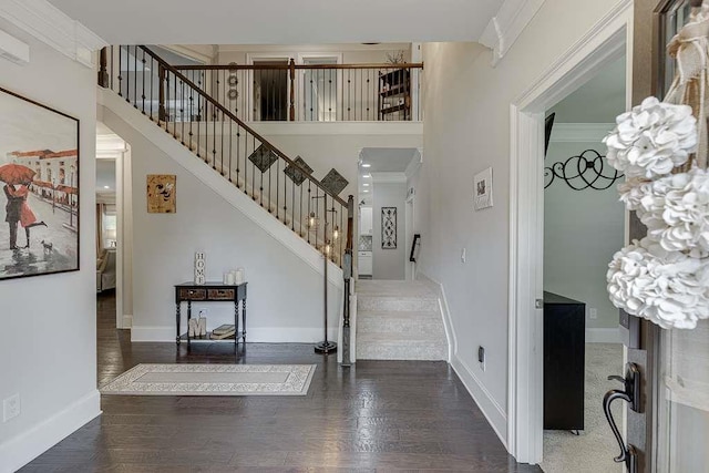 470 Wagon Hill Ln, Sugar Hill, GA 30518 - entryway featuring stairs, a high ceiling, wood finished floors, and baseboards