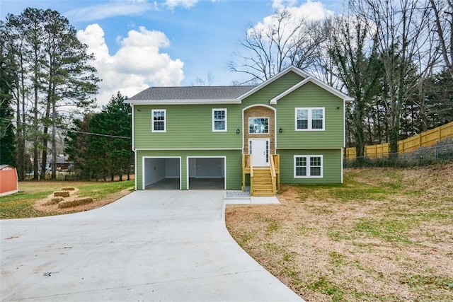 split foyer home featuring a garage