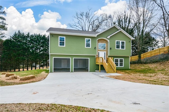 raised ranch featuring a garage