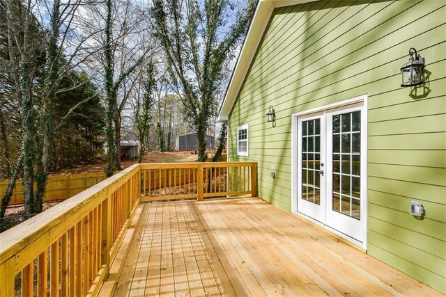 wooden deck featuring french doors