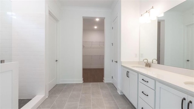 7020 Cottage Grove Dr, Flowery Branch, GA 30542 - bathroom featuring double vanity, a walk in shower, and a spacious closet