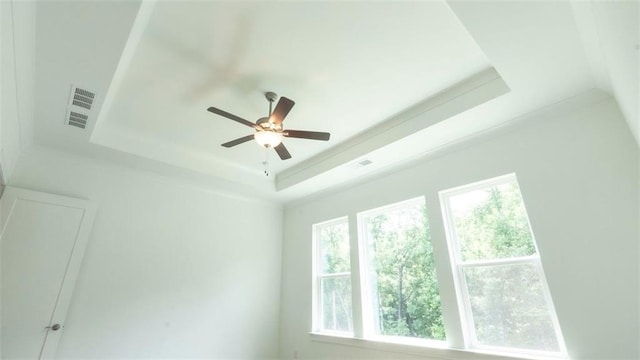 7020 Cottage Grove Dr, Flowery Branch, GA 30542 - detailed view of a raised ceiling and ceiling fan