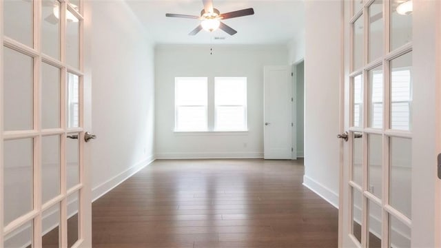 7020 Cottage Grove Dr, Flowery Branch, GA 30542 - empty room featuring french doors, hardwood / wood-style flooring, a ceiling fan, and crown molding