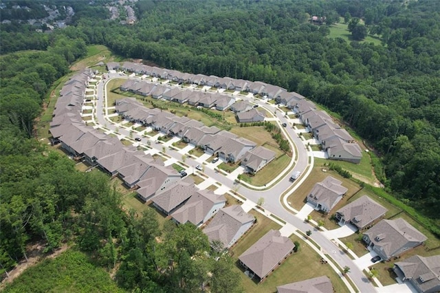 7020 Cottage Grove Dr, Flowery Branch, GA 30542 - aerial overview of property's location featuring a forest and nearby suburban area