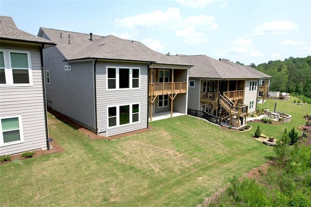7020 Cottage Grove Dr, Flowery Branch, GA 30542 - rear view of property with a lawn, roof with shingles, stairway, and a deck