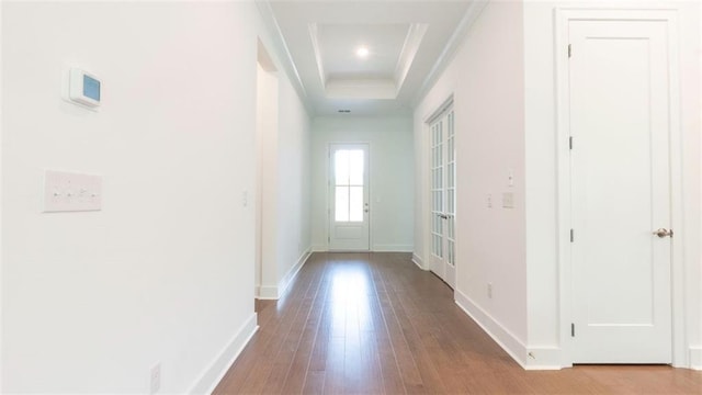 7020 Cottage Grove Dr, Flowery Branch, GA 30542 - hallway featuring hardwood / wood-style flooring, crown molding, and a tray ceiling