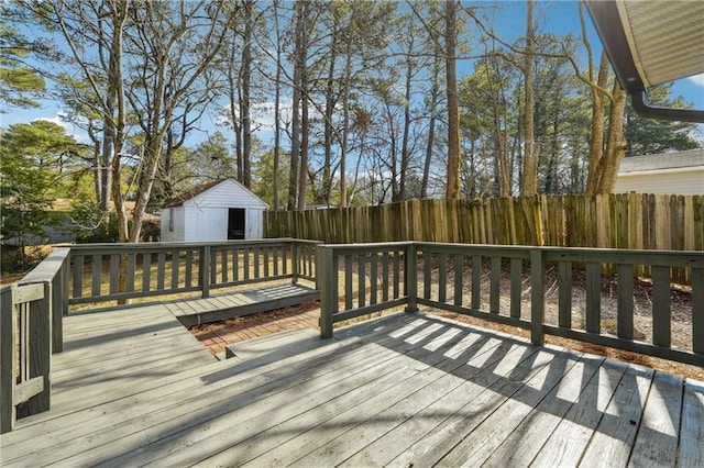 wooden deck featuring a shed