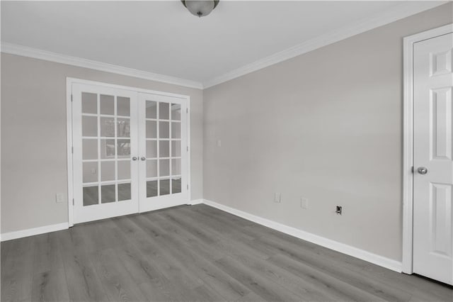 unfurnished room featuring french doors, baseboards, and crown molding