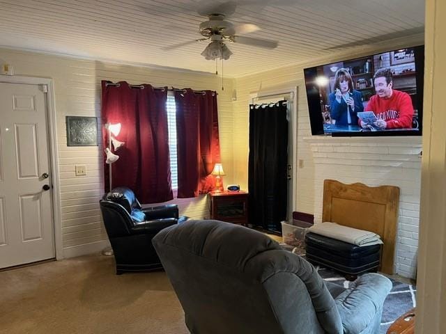 carpeted home theater room featuring ceiling fan