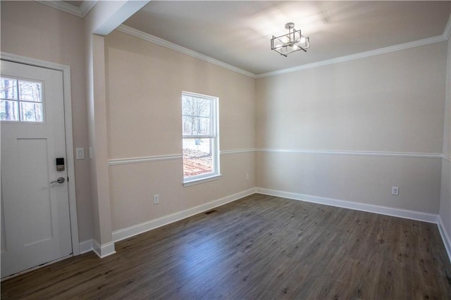 foyer entrance with ornamental molding, baseboards, and dark wood-style floors