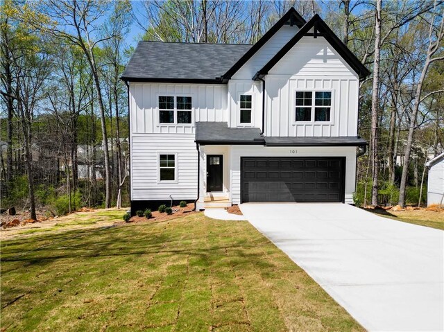 view of side of home featuring a garage