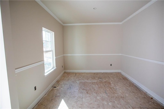 spare room with ornamental molding and a wealth of natural light