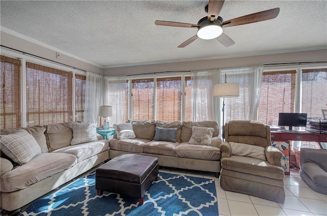 living room featuring light tile patterned floors, a textured ceiling, crown molding, and a ceiling fan