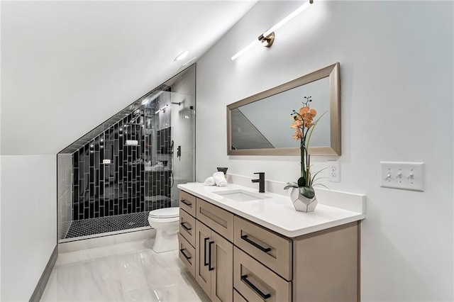 bathroom featuring tile patterned floors, vanity, toilet, and walk in shower